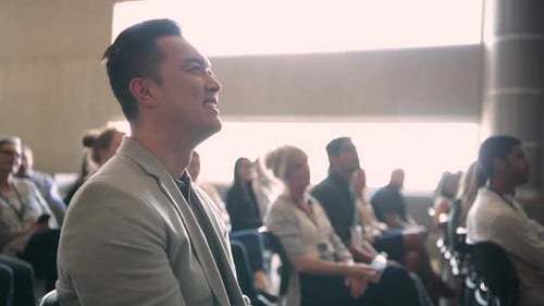 People Listening to Presentation at Corporate Event