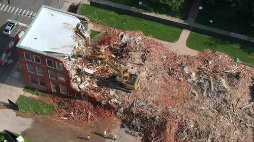 Building Demolition Site of Historic Edwards Building in Berea Kentucky Hydraulic Crusher Excavator