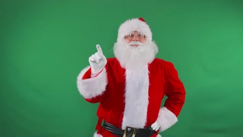 Santa with finger swipes at Christmas sales offers on invisible screen, flips through discount ads