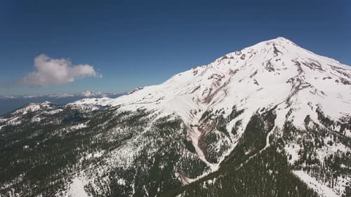 Cascade Mountains, Circa-2019. Aerial View of Mount Shasta. From Helicopter With