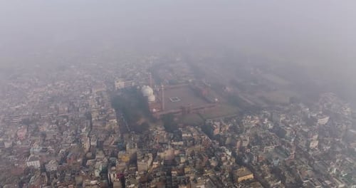 Aerial view of bustling Chandni Chowk with mosque, India.