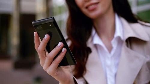 Closeup Young Business Woman Scroling in Smartphone While Sitting in Cafe Female Hands Scrolling