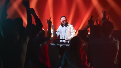 Night Club Party DJ Live Performance Stage Crowded People Dancing Illuminated Discotheque