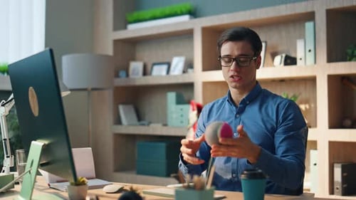 Friendly Freelancer Videocalling Computer at Office Smiling Man Gesturing Hands