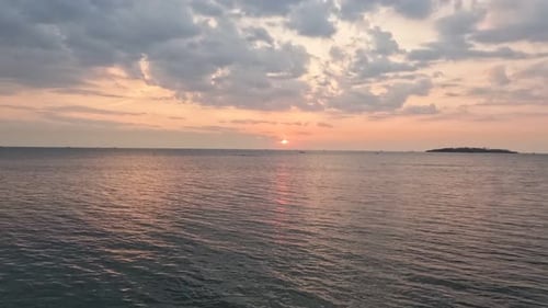 Beautiful timelapse of sunset or sunrise view over sea surface beautiful wave.