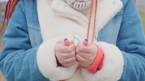 Crop Woman Breaking Cigarette and Quitting Smoking