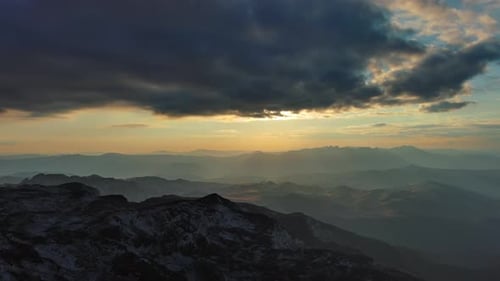 Sunset Over Mountain with Dramatic Clouds