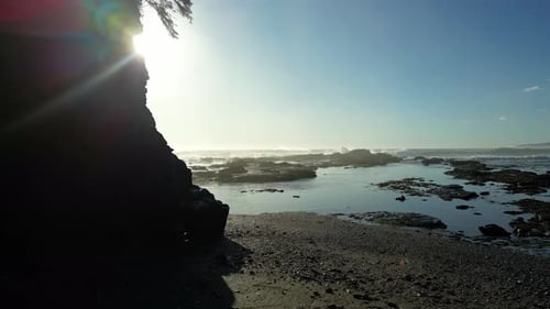 Rocky Shore on the Pacific Ocean Coast Sunny Sunset