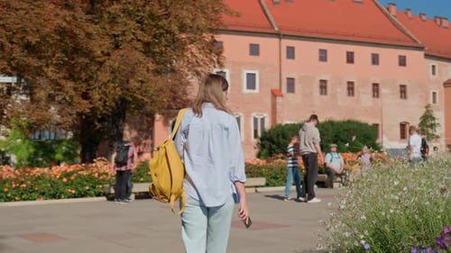 Woman Walking in Wawel Castle in Krakow