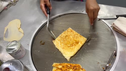 Closeup of a Thai Roti Dessert Stall in Street Food Market in Bangkok Thailand
