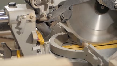 A Circular Saw Cuts a Wooden Stake for Making Furniture
