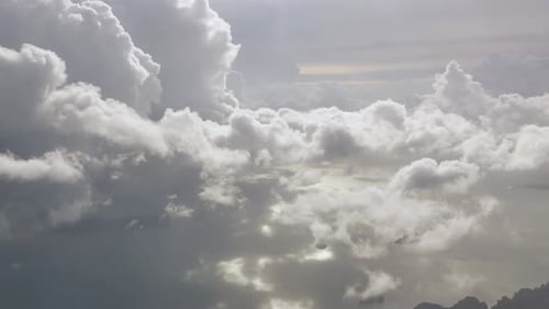 view of cloudy above the sky from plane -drone in daytime