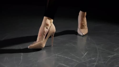 Woman Walking in High Heels in the Dark