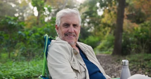 Senior Man Smiling Outdoors in Nature