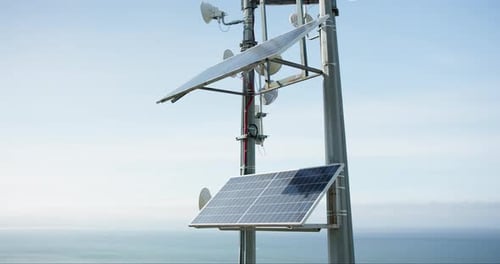 Solar panel, energy and roof with ocean, sky and horizon with sustainability