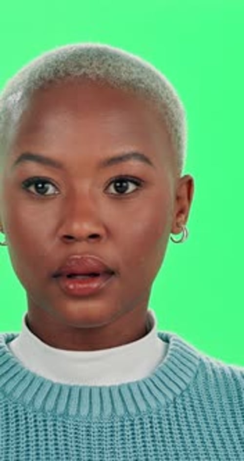 Shocked, surprise and face of black woman on green screen for news, notification and announcement