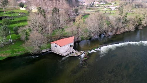 Aerial view of water mill by Limia River, Portugal.