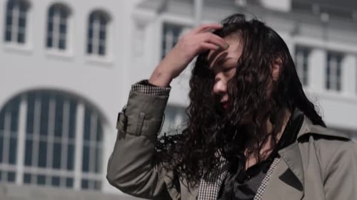 Joyous and Fastpaced Walk of Asian Female Handheld Camera Shots Adding Dynamic Feel to Her Happy