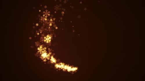 Golden glitter trail with glowing snowflakes.