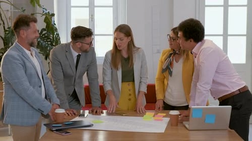 Group of business people working in office.