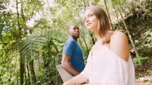 Young Diverse Couple Hiking in Australian Forest