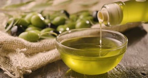 Composition of freshly harvested Italian genuine olives and oil . Concept of: olives, italian food