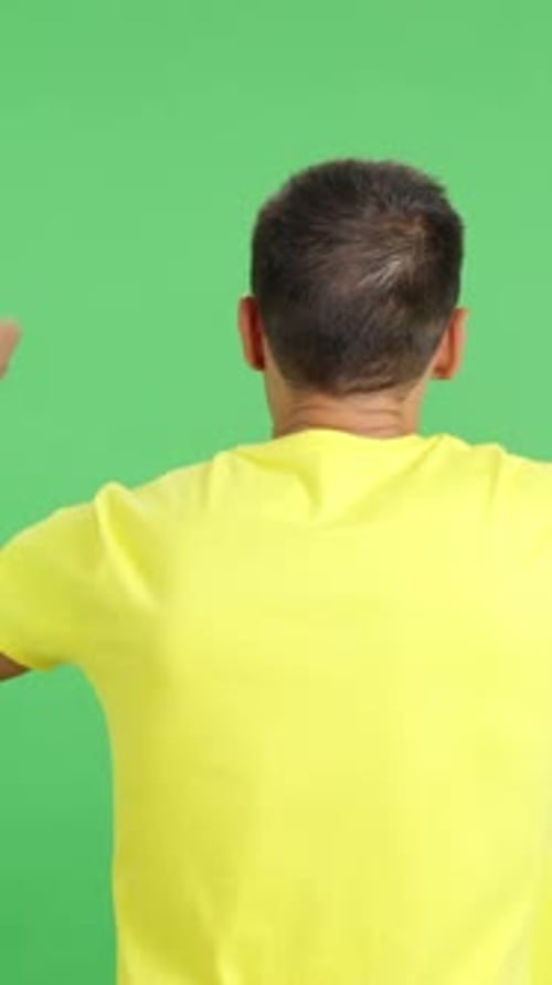 Rear View of a Man Waving a Ukrainian Pennant