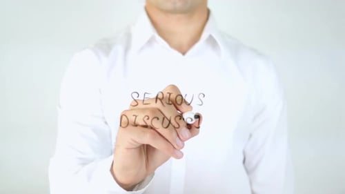 Serious Discussion, Man Writing on Glass