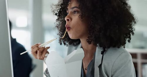 Chinese food, computer and a designer business woman reading information in the office while eating
