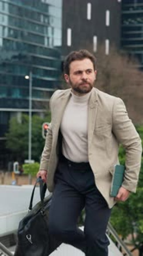 Businessman, walking and outdoor in city with bag, tablet and commute for real estate appointment