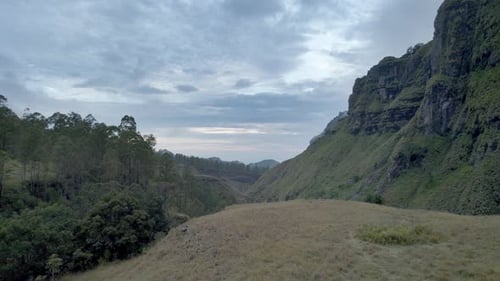 Aerial View of Inerie Mountain Foot at Cloudy Sunset