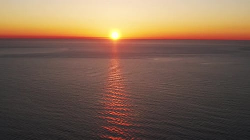 Amazing Ocean Sunset In 4 K. Sun Set Background. Orange Sun Over The Sea