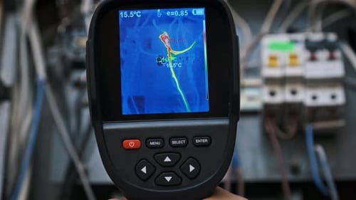 Thermal Camera Inspecting Electrical Wiring Panel