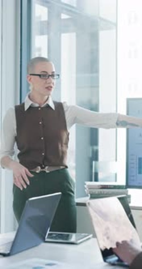 Presentation, investment and woman in office, talking and feedback for company profit growth