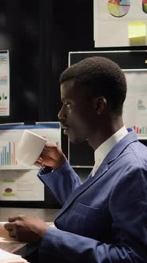 Vertical Video Police Officer Having Coffee in Office