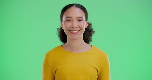 Happy, confident and face of woman by green screen with positive attitude for artistic career