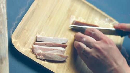 Sausage Sliced on a Cutting Board