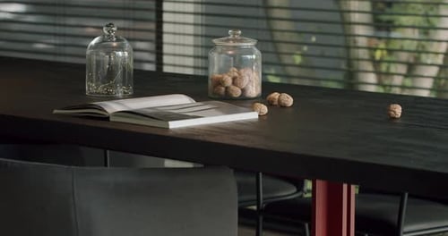 Closeup view on open magazine on tabletop, modern workplace at home