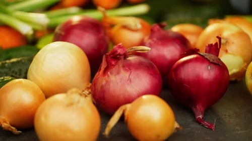 Background Video of an Onion Rolling on the Table
