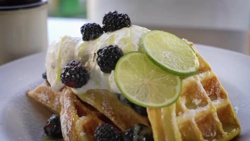 Waffles with Whipped Cream and Berries