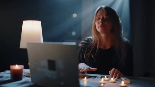 Mystical Woman with Candles and Laptop