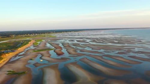 Cape Cod Bay Aerial Drone Footage of Beach at Low Tide with People Walking, Sand Bars and Puddles Du