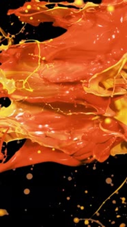 Abstract Splashes of Yellow and Red Paint on Black