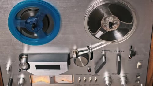 Retro Reel-to-Reel Tape Recorder in Operation