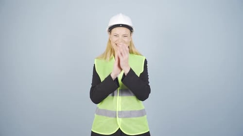 Engineer applauding enthusiastically.