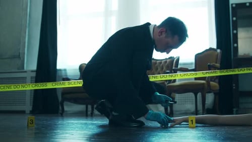 Detective Examines Crime Scene Evidence with Magnifying Glass