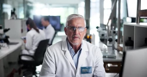 Senior Scientist Smiling in a Bright Laboratory