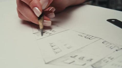 Hand Drawing Architectural Design on Paper