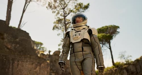 Planet, travel and astronaut walking in forest to explore abandoned world, planet and universe