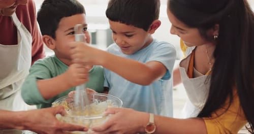 Family Baking Together in Kitchen